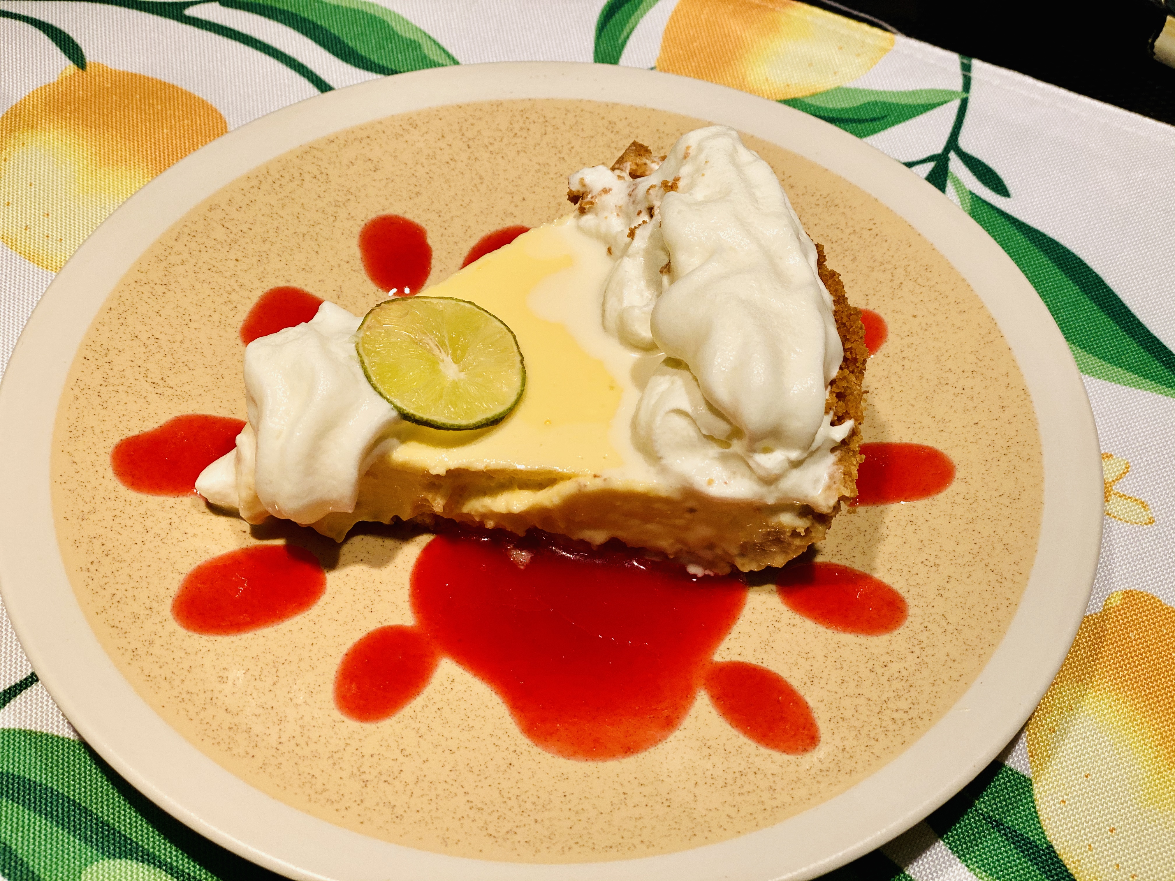 Key Lime Raspberry Pie KEY LIME PIE WITH WHIPPED CREAM AND RASPBERRY SAUCE – It’s About the Food!